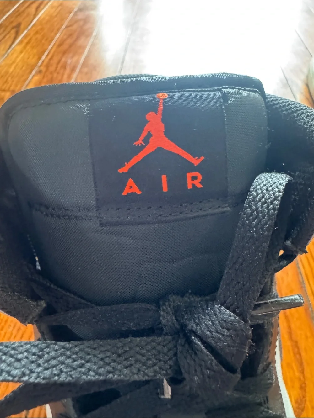 Black White and Orange High-Top Jordan 1